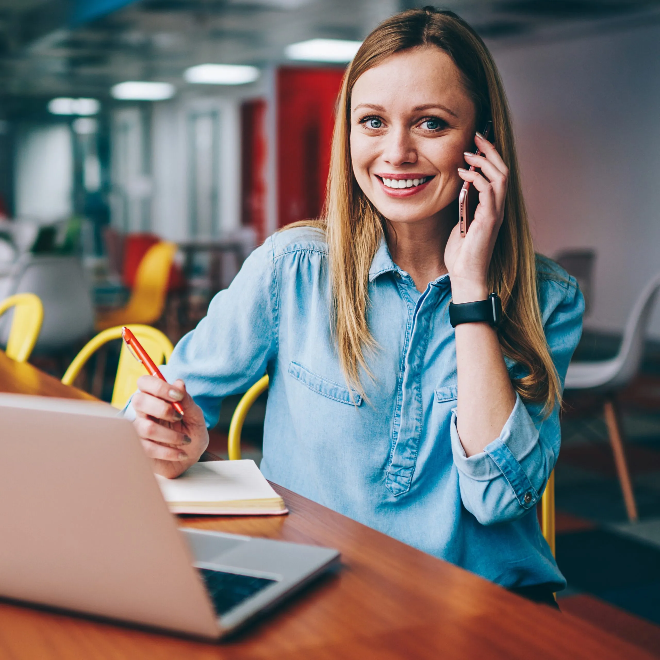 cheerful-freelancer-talking-on-mobile-phone-in-caf-2023-11-27-04-51-06-utc - Copy