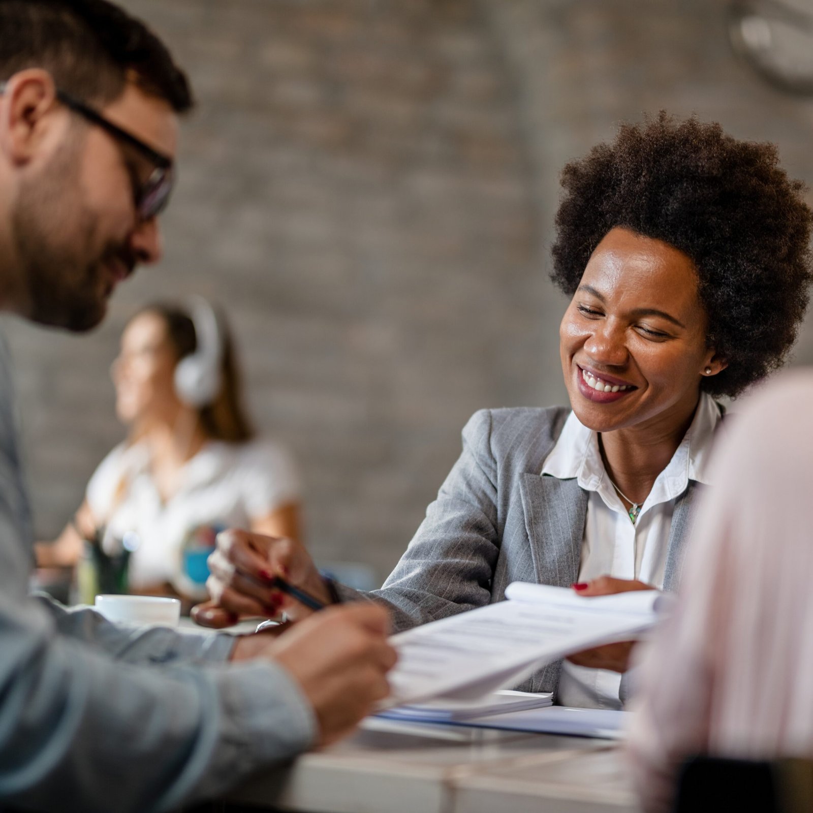 Business man shake hands with business women agreeing on partner