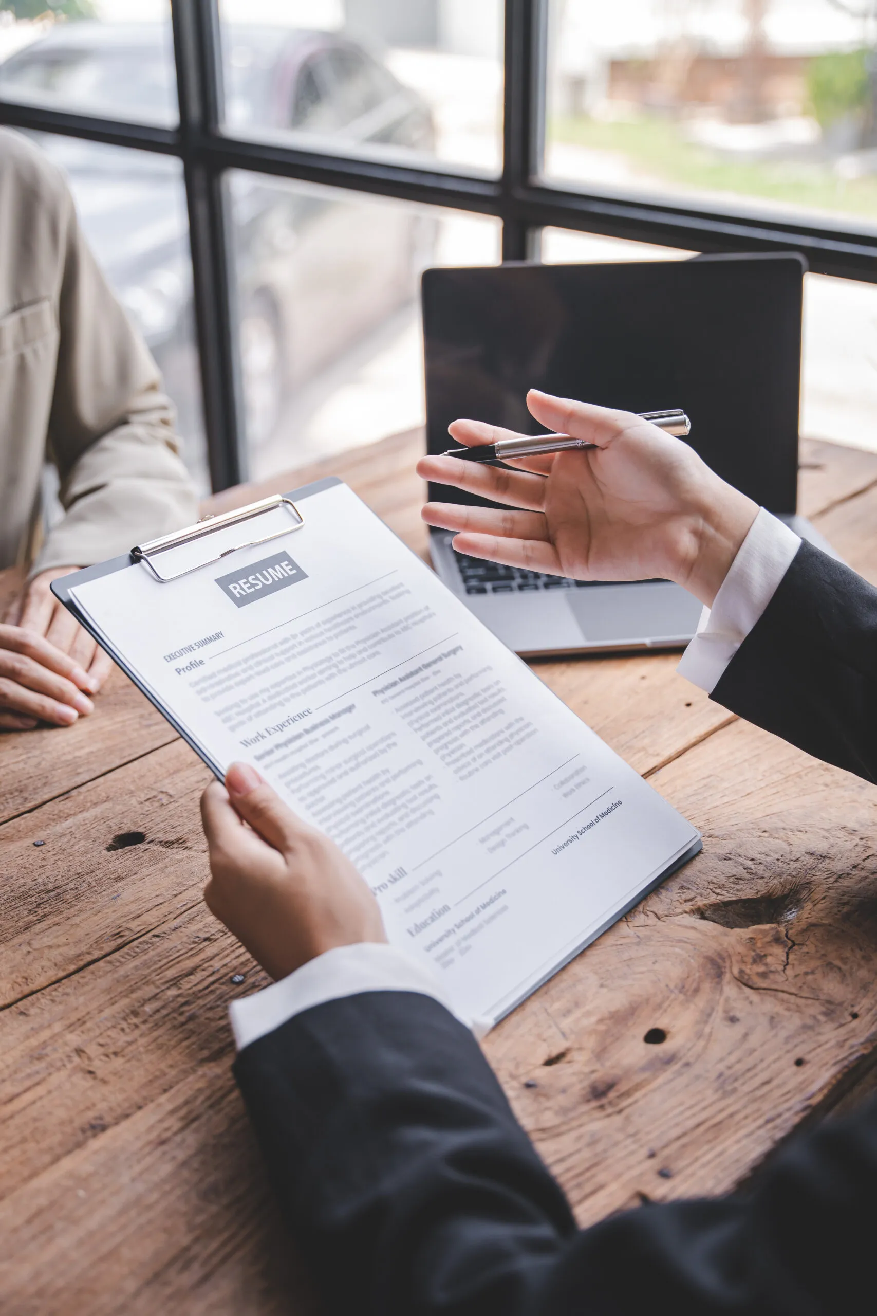 Portrait of a person interviewing for a job and<br />
Submit resume to